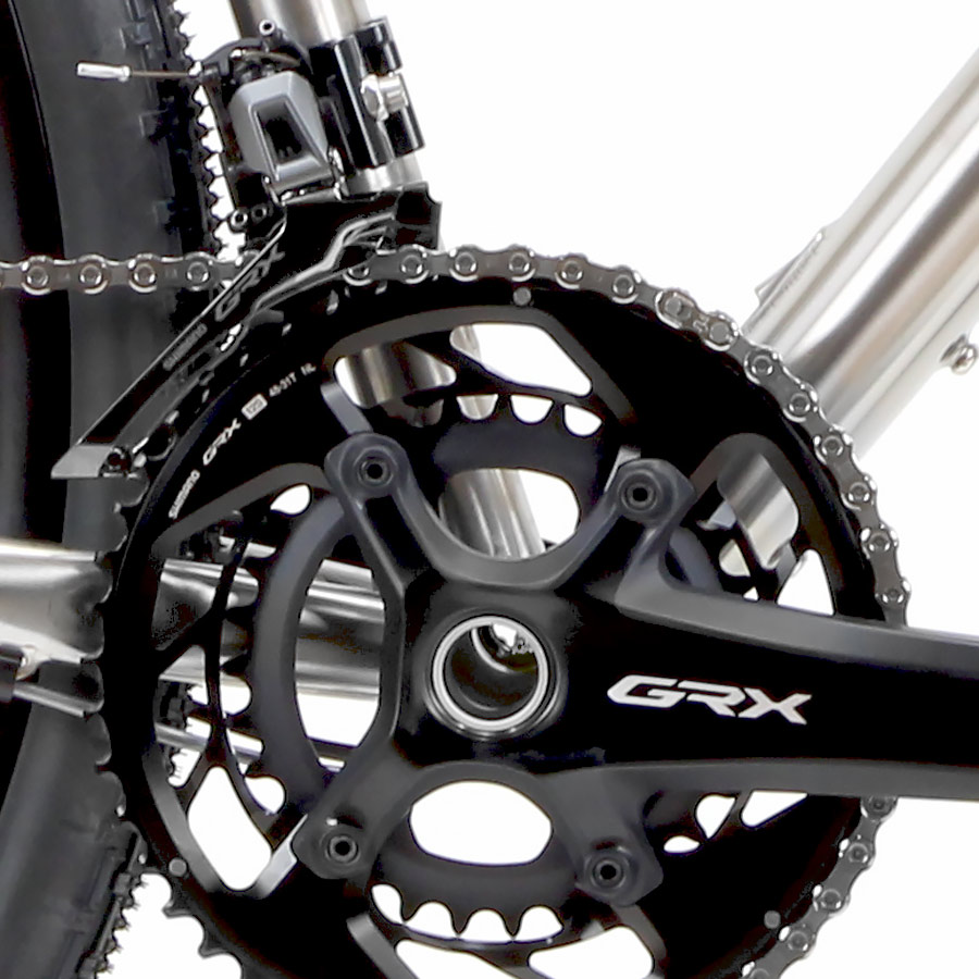 Close-up of a bicycle crankset and drivetrain components