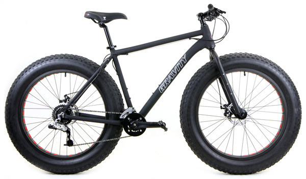Fat tire bike with oversized tires designed for rough terrain